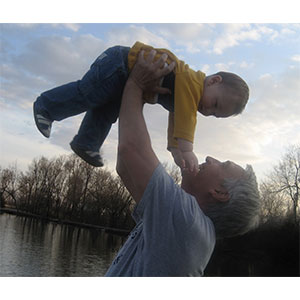 Papa telling Caden he can do anything, well maybe not fly.